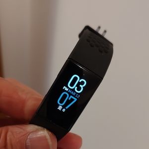 Fitbit Charge 4 Fitness and Activity Tracker with charging cord (used)